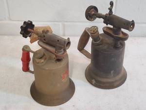 lot 219 image: (2) Vintage Torches for Garage Decor