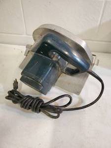 lot 143 image: 8-14 Double Insulated Circular Saw