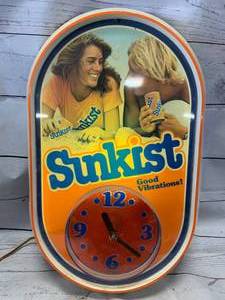 lot 20 image: VintageSunkistLight Clock Sign Approximately 13 x 22