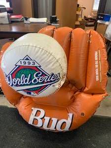 lot 88 image: 1983 Budweiser World Series3 Foot LongInflatable Glove & Ball
