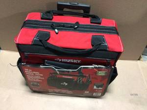 18 in. Zipper Top Rolling Weather Resistant Tool Tote Bag in Red with 18 total pockets and heavy-duty telescoping handle by Husky