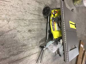 Ryobi 15 Amp 10 in. Expanded Capacity Table Saw With Rolling Stand customer return see pictures