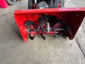 Power Max 824 OE 24 in. 252cc Two-Stage Electric Start Gas Snow Blower by Toro in good conditions