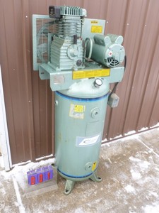 lot 1 image: C-Aire 230 volt 30 gallon air compressor. Certified tank. Shop upgraded to bigger unit. Tested & works. As shown. THIS ITEM HAS A RESERVE.