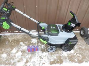 lot 2 image: E-Go 56 volt snow blower. Unable to test. No battery or charger. Looks new. As shown.