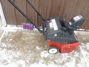 lot 4 image: MTD 5 hp gas snow thrower. Lightly used. Tested & works. As shown.