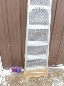 lot 7 image: New 6 aluminum step ladder. As shown.