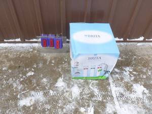 lot 8 image: Brita under sink water filtration system. New in box. As shown.