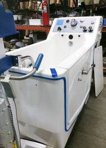 lot 2 image: MSRP $12,000 COMMERCIAL GRADE PENNER CASCADE WALK IN BATHING SPA WRIGHT SIDE ENTRY #1 - GREAT WORKING CONDITION  PLEASE SEE ALL THE PDF & ATTACHMENTS FOR SIZE & INFO FOR INSTALLING IT IN YOUR HOME  LIFT CAN BE PURCHASED IN LOT 5