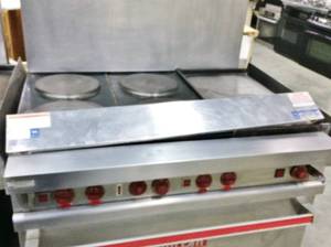 lot 6 image: WOW MSRP $6000 HIGH QUALITY & PERFORMANCE VULCAN NSF 4 HIGH SPEED BURNERS RANGE WGRIDDLE & ELECTRIC OVEN - GREAT WORKING CONDITION - VERY CLEAN INSIDE & OUT COMES WITH 2 NONSTICK OVEN RACKS - FRONT BASE PANEL INCLUDED SIMPLY BEAUTIFUL 