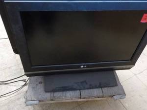 LG 26 TV powers on...