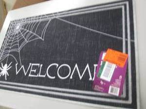 lot 16 image: spider welcome mat ...