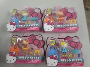 lot 45 image: 4 new hello kittys mini dolls ...