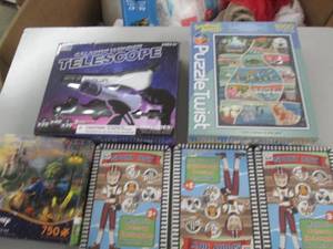 lot 53 image: 2 new puzzles a new telescope and 3...