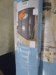 lot 303 image: garment rack and covered closet...