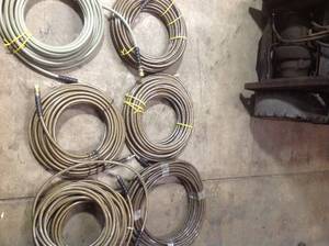 Lot of assorted preasure washer hoses see pictures