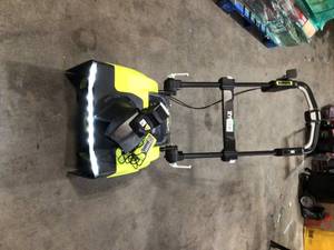 Ryobi 21 in. 40-Volt Brushless Cordless Electric Snow Blower with Two 5.0 Ah Batteries and Charger Included in working conditions
