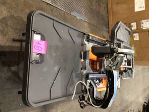 RIDGID 10 in. Wet Tile Saw with Stand used in working conditions