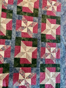 lot 31 image: Quilt with Floral Backing