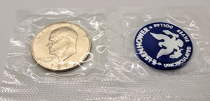 lot 215 image: Pair of Uncirculated 1973 Eisenhower Silver Dollars