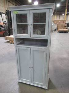 lot 141 image: Hampton Harbor 25 in. W 4-Door Tall Cabinet in Dove Grey, 4772910270 - Slight Scratch and Dent - Missing Drawer.