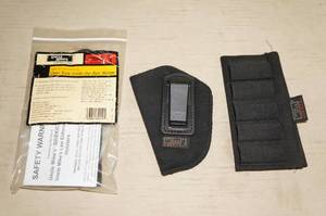 lot 120 image: 3 Uncle Mikes Accessories, Holster, Shell Holder