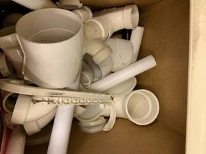 ASSORTED PVC PLUMBING PIECES
