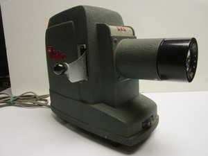 lot 912 image: SKYLINE SLIDE PROJECTOR, RADIANT MOVIE SCREEN