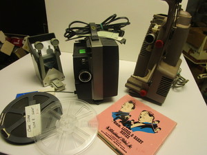 lot 913 image: 8 MM MOVIE PROJECTORS AND ACCESSORIES