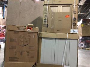 Pallet of assorted Cabinets not used see pictures