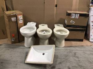 Pallet with assorted Toilet Bowls and sink see pictures