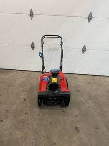 Toro Power Clear 518 ZE 18 in. Single-Stage Gas Snow Blower in working conditions