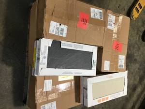 Pallet with assorted wood flooring see pictures