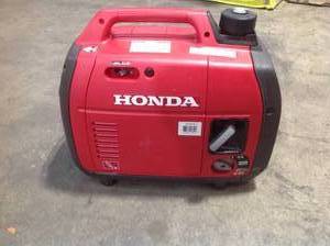 Honda 2200-Watt Recoil Start Gasoline Powered Inverter Generator with 20 Amp Outlet used in working conditions
