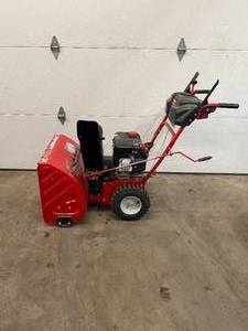 24 in. 208 cc Two-Stage Gas Snow Blower with Electric Start Self Propelled by Troy-Bilt in working conditions
