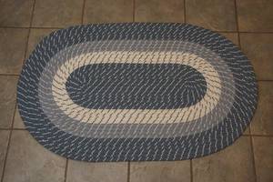 Oval braided rug