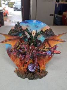 lot 214 image: Gnarly Wizard and Three Headed Dragon Figurine