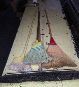 lot 242 image: Four Brooms