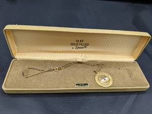 lot 71 image: 14 Kt. Gold Filled Necklace with Onan Anniversary Pendant