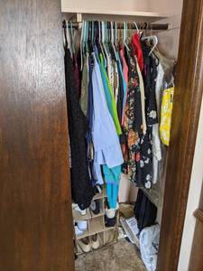 lot 117 image: Closet Bursting with Clothing and Shoes
