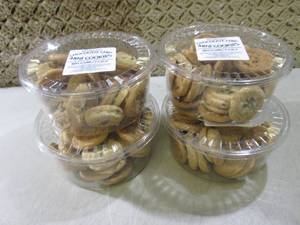 lot 132 image: (C-1) 4 Containers of Chocolate Chi...