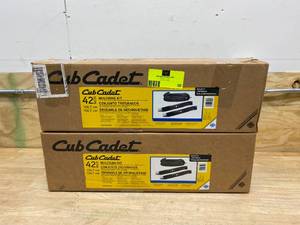 lot 28 image: CUB CADET Lot of 2-  Original Equipment 42 in. Mulching Kits with Blades for Lawn Tractors and Zero Turn Mowers (2012 and After)