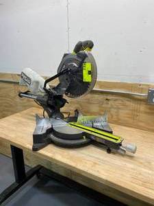 lot 43 image: RYOBI 15 Amp 10 in. Sliding Compound Miter Saw with LED