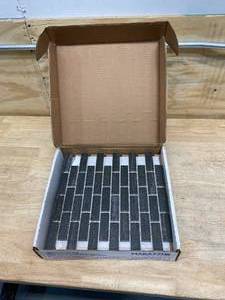 lot 72 image: MARAZZI Lot of 8-  12 x 12 x 14Ceramic Mosaic Tile in Graphite
