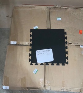 SOLID BLACK 24IN RUBBER FLOOR TILE (4 PACK OF 6) AND INTERLOCKING WALNUT 24IN FOAM TILES.(1 PACK OF 6). SEE PICTURES