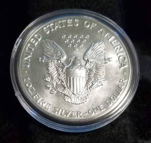 1987 AMERICAN SILVER EAGLE 1 TROY OZ. .999 FINE SILVER IN AIRTITE