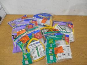 Assorted box lot of yellow gas line Connectors