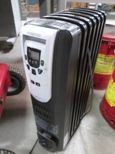 lot 63 image: Kenwood 1500W Electric Oil-Filled R...