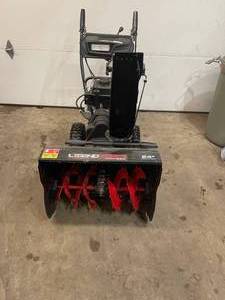 24 in. Two-Stage Gas Snow Blower with Electric Start by Legend Force in working conditions