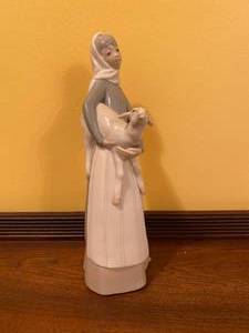 lot 19 image: Retired Lladro Woman with Sheep Figurine